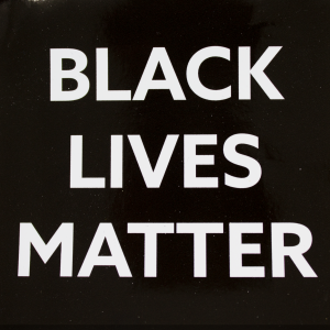 "Black Lives Matter" on static cling. White text on black background.
